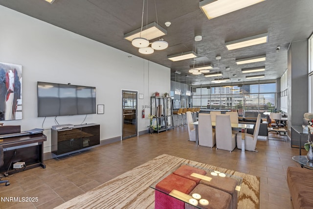 100 N Arlington Ave Unit 17G, Reno, NV 89501 - living room featuring tile patterned floors
