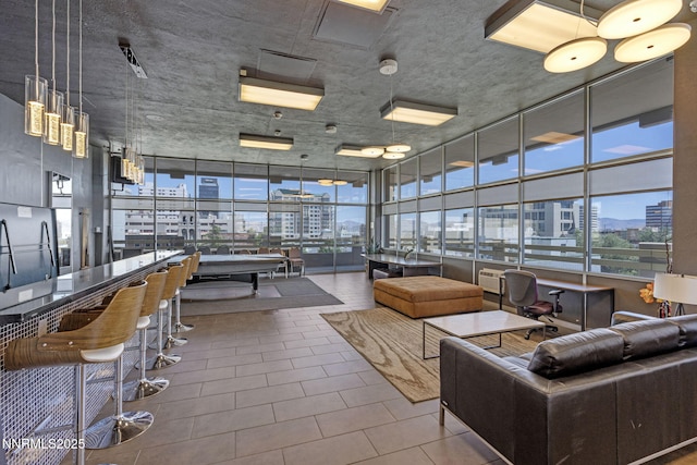 100 N Arlington Ave Unit 17G, Reno, NV 89501 - community lobby featuring a city view and expansive windows