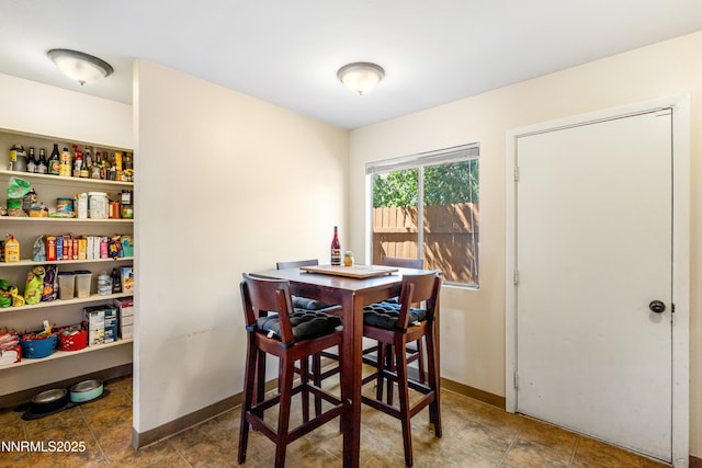 1414 E 9th St Unit 4, Reno, NV 89512 - dining space featuring baseboards