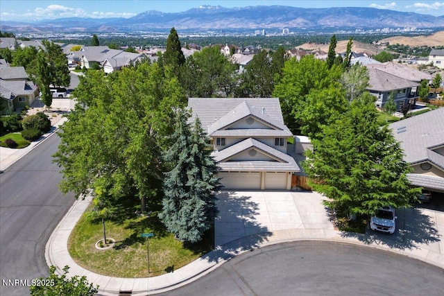 4413 Desert Hills Ct, Sparks, NV 89436 - aerial view of residential area featuring a mountainous background