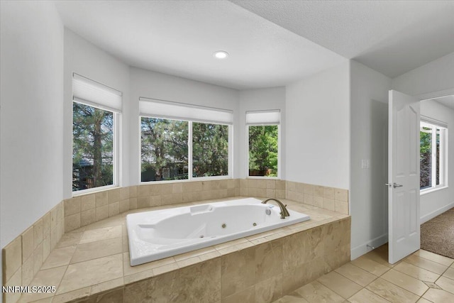 4413 Desert Hills Ct, Sparks, NV 89436 - full bathroom featuring a tub with jets, tile patterned floors, and recessed lighting