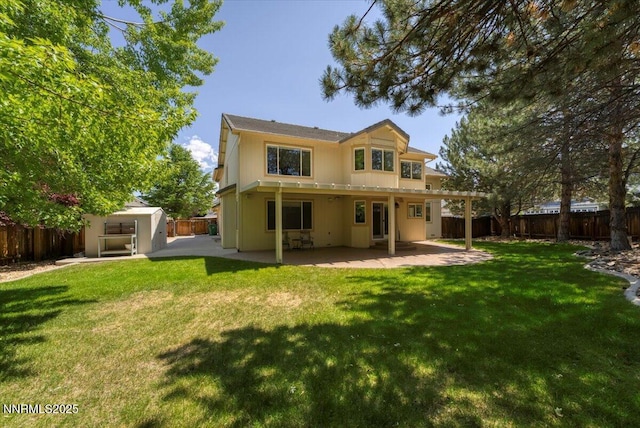 4413 Desert Hills Ct, Sparks, NV 89436 - rear view of property with a fenced backyard, a patio area, and a storage shed