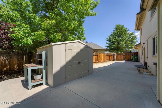 4413 Desert Hills Ct, Sparks, NV 89436 - fenced backyard featuring a patio area and a storage shed