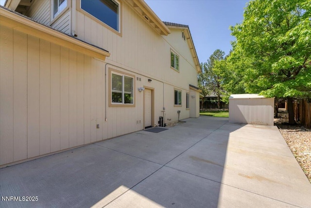 4413 Desert Hills Ct, Sparks, NV 89436 - view of property exterior featuring a shed and a patio area