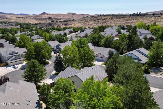 4413 Desert Hills Ct, Sparks, NV 89436 - aerial view of residential area with a mountainous background