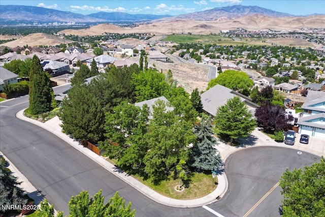 4413 Desert Hills Ct, Sparks, NV 89436 - aerial perspective of suburban area with a mountainous background