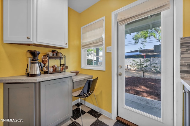 1725 Westfield Ave, Reno, NV 89509 - doorway featuring tile patterned floors and baseboards