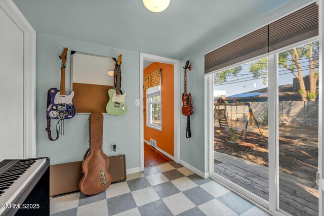 1725 Westfield Ave, Reno, NV 89509 - doorway to outside with tile patterned floors and plenty of natural light