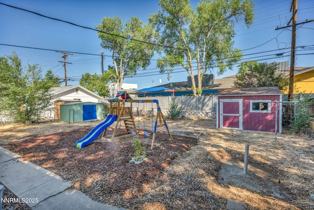 1725 Westfield Ave, Reno, NV 89509 - view of yard featuring a storage shed and a playground