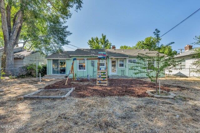 1725 Westfield Ave, Reno, NV 89509 - view of front of house featuring a chimney and board and batten siding