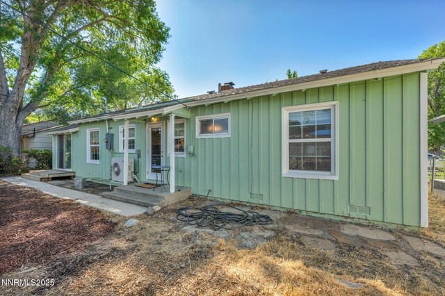 1725 Westfield Ave, Reno, NV 89509 - ranch-style house with board and batten siding and a chimney