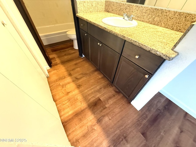 2450 Lymbery St Unit 219, Reno, NV 89509 - bathroom featuring wood finished floors and vanity