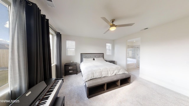 2251 Slater Mill Dr, Sparks, NV 89441 - carpeted bedroom with ensuite bathroom and a ceiling fan