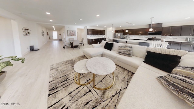 2251 Slater Mill Dr, Sparks, NV 89441 - living room featuring recessed lighting and light wood-type flooring