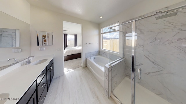 2251 Slater Mill Dr, Sparks, NV 89441 - bathroom with double vanity, ensuite bathroom, a garden tub, and a marble finish shower