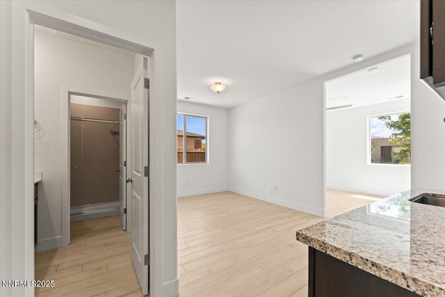 2251 Slater Mill Dr, Sparks, NV 89441 - hall with light wood-style flooring and baseboards