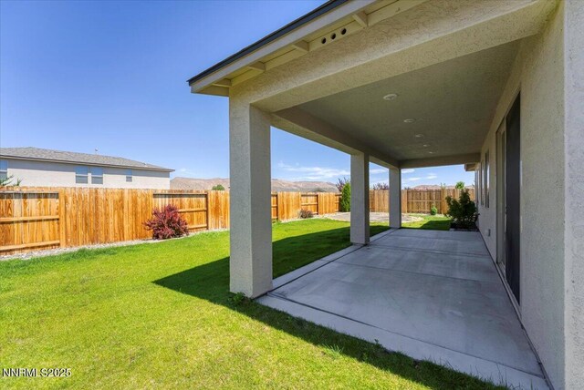 2251 Slater Mill Dr, Sparks, NV 89441 - fenced backyard featuring a patio area