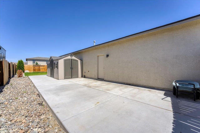 2251 Slater Mill Dr, Sparks, NV 89441 - view of patio featuring a storage shed