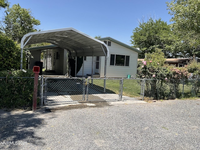 1685 Elmhurst Ave, Lovelock, NV 89419 - view of front facade featuring a gate and a carport
