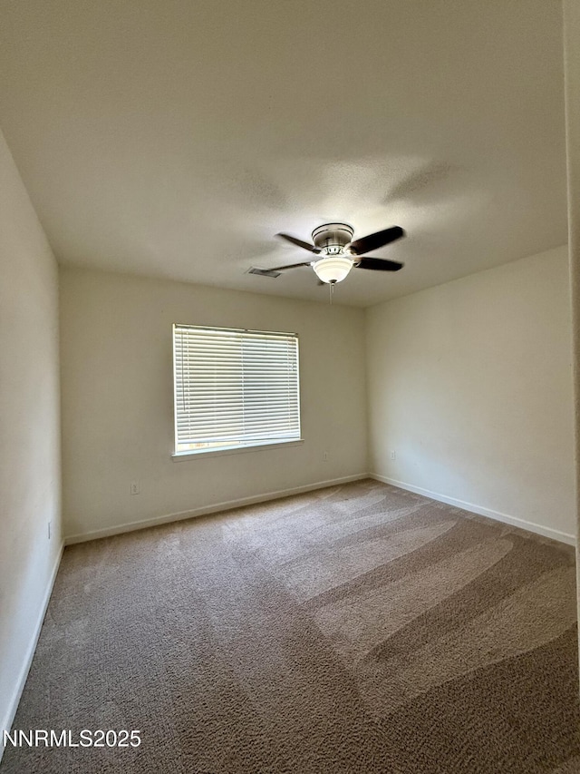 1122 Ferretto Pkwy, Dayton, NV 89403 - carpeted empty room with a ceiling fan and baseboards