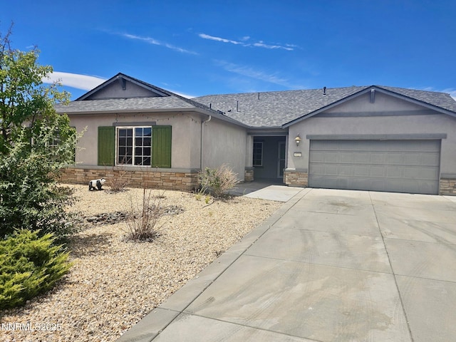 1122 Ferretto Pkwy, Dayton, NV 89403 - single story home with stone siding, an attached garage, concrete driveway, and a shingled roof