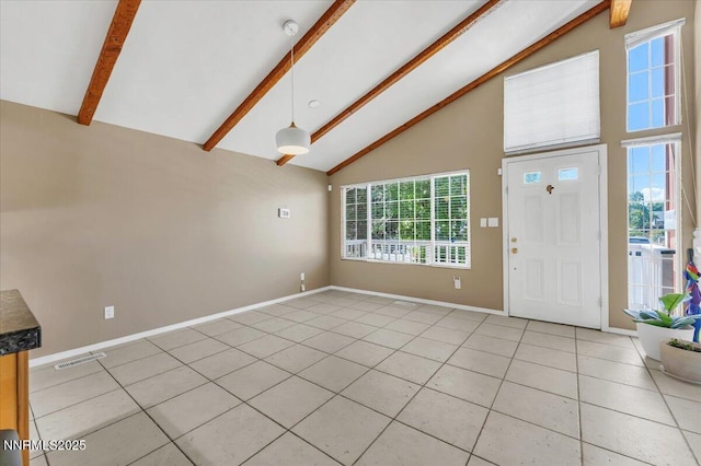 1782 Driftwood Dr, Sparks, NV 89431 - foyer featuring high vaulted ceiling, beam ceiling, and light tile patterned floors