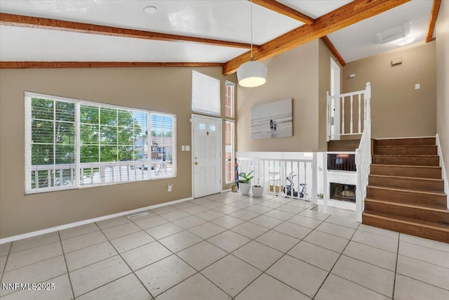 1782 Driftwood Dr, Sparks, NV 89431 - entrance foyer featuring tile patterned flooring, beamed ceiling, a fireplace, stairway, and high vaulted ceiling