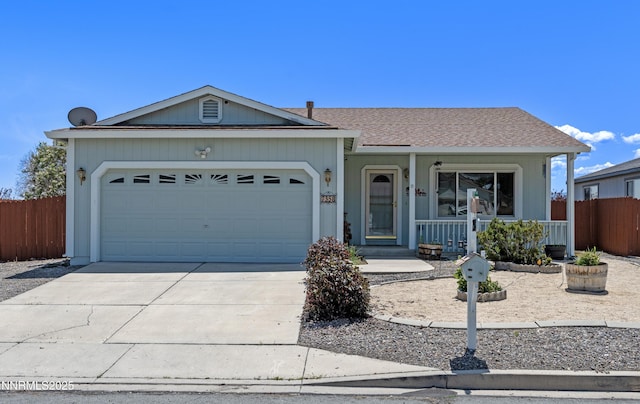 7358 Rubens Ct, Sun Valley, NV 89433 - ranch-style house featuring a porch, driveway, and an attached garage