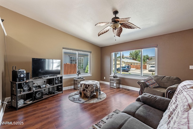 7358 Rubens Ct, Sun Valley, NV 89433 - living room with dark wood-type flooring, ceiling fan, and lofted ceiling