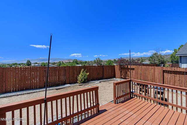 7358 Rubens Ct, Sun Valley, NV 89433 - wooden terrace featuring a fenced backyard