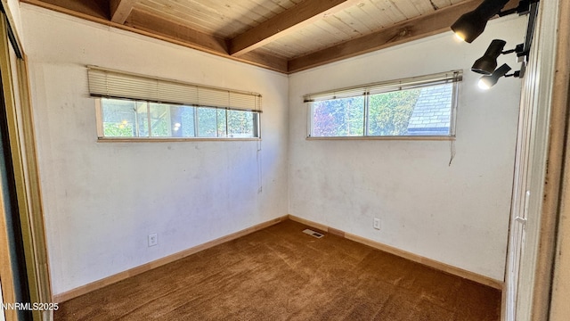 157 Cottonwood Dr, Stateline, NV 89449 - carpeted empty room with a wood ceiling with exposed beams and baseboards