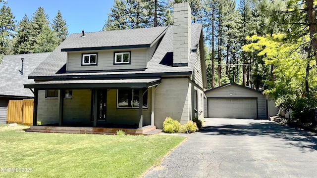 157 Cottonwood Dr, Stateline, NV 89449 - view of front facade featuring covered porch, an outdoor structure, a chimney, and a front yard