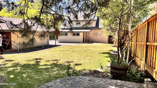 157 Cottonwood Dr, Stateline, NV 89449 - rear view of house featuring a patio area and a fenced backyard