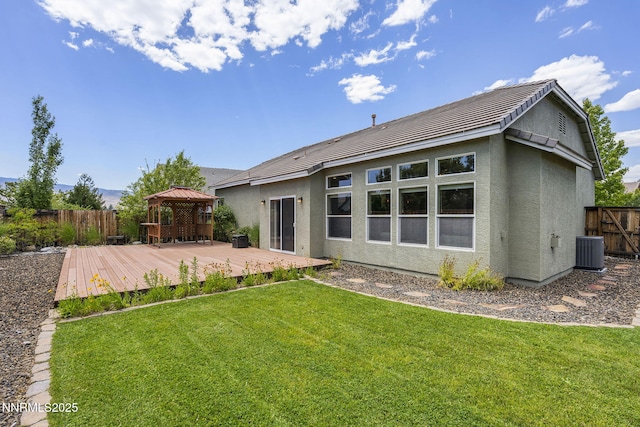1660 Murrieta Ct, Reno, NV 89521 - rear view of house featuring a gazebo, a deck, stucco siding, and a tile roof