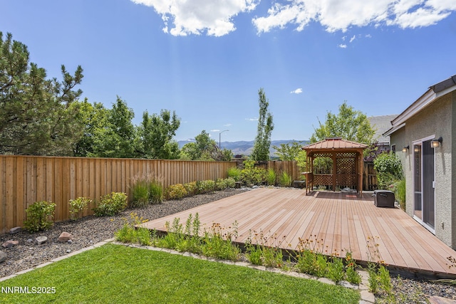 1660 Murrieta Ct, Reno, NV 89521 - wooden terrace featuring a gazebo, a fenced backyard, and a mountain view