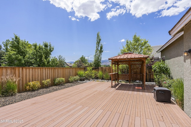 1660 Murrieta Ct, Reno, NV 89521 - wooden terrace with a gazebo and a fenced backyard