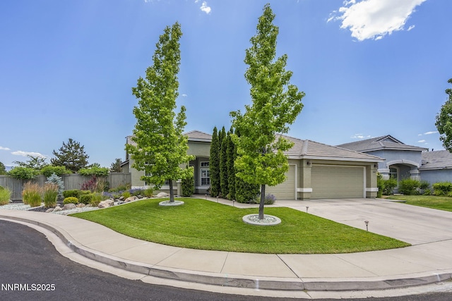 1660 Murrieta Ct, Reno, NV 89521 - obstructed view of property with a garage, driveway, a tiled roof, and stucco siding