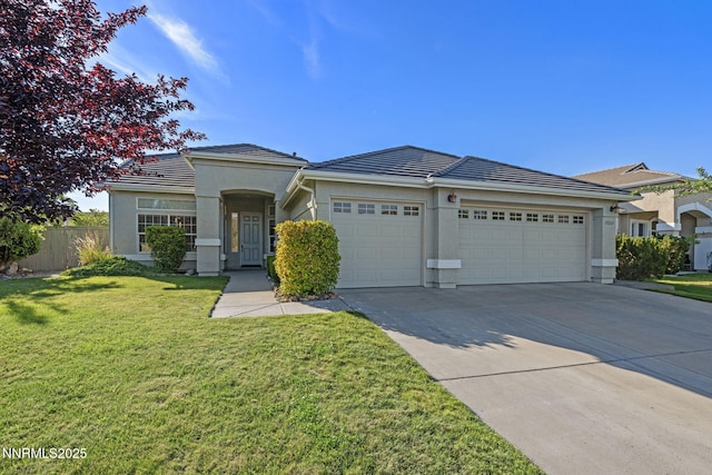 10265 Donnay Ct, Reno, NV 89521 - view of front of home with a garage, concrete driveway, stucco siding, and a tiled roof