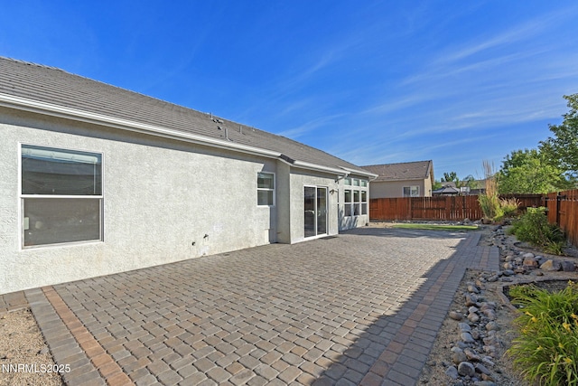 10265 Donnay Ct, Reno, NV 89521 - fenced backyard with a patio