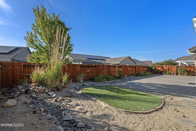 10265 Donnay Ct, Reno, NV 89521 - fenced backyard featuring a patio