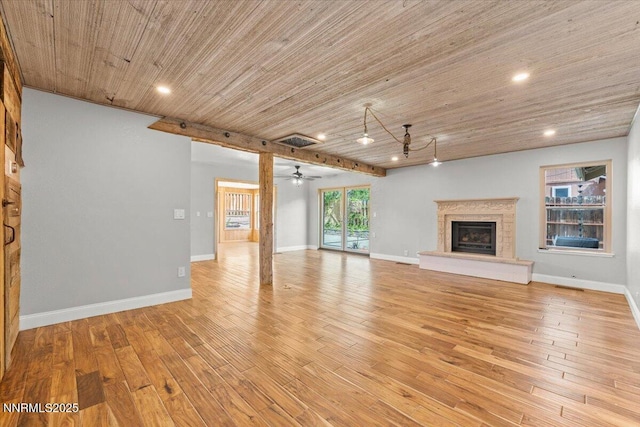 4710 Yukon Ct, Carson City, NV 89706 - unfurnished living room with wood ceiling, light wood-style flooring, a fireplace, recessed lighting, and a ceiling fan