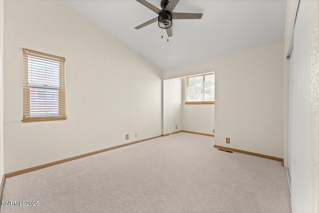 4710 Yukon Ct, Carson City, NV 89706 - spare room with lofted ceiling, light colored carpet, and ceiling fan