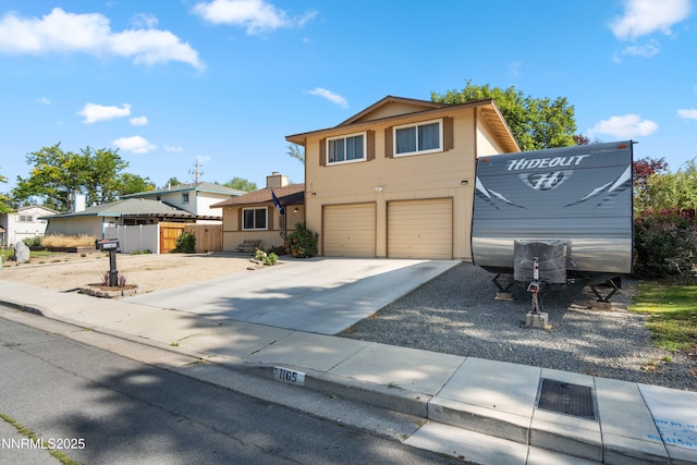 1165 Autumn Hills Dr, Reno, NV 89511 - traditional-style house with an attached garage and concrete driveway