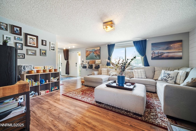 1165 Autumn Hills Dr, Reno, NV 89511 - living area featuring wood finished floors and a textured ceiling