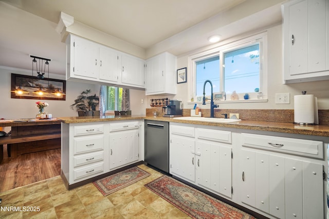 1165 Autumn Hills Dr, Reno, NV 89511 - kitchen with dishwasher, white cabinets, and a peninsula