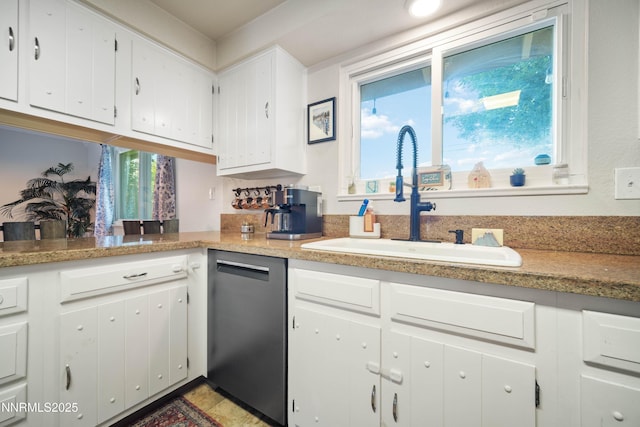1165 Autumn Hills Dr, Reno, NV 89511 - kitchen featuring dishwasher, white cabinetry, and light countertops