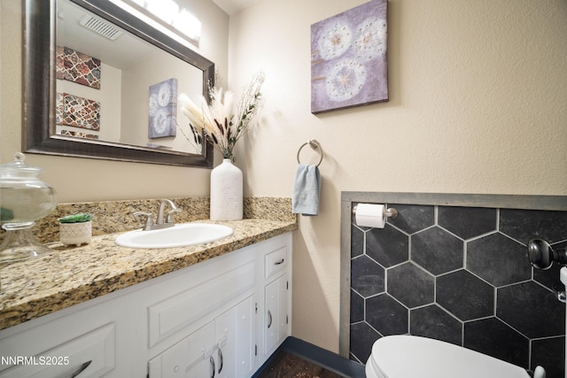 1165 Autumn Hills Dr, Reno, NV 89511 - half bathroom with vanity and wood finished floors
