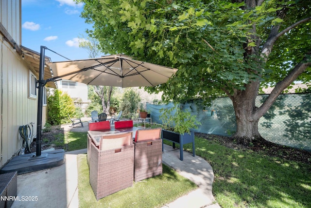 1165 Autumn Hills Dr, Reno, NV 89511 - fenced backyard with a patio area
