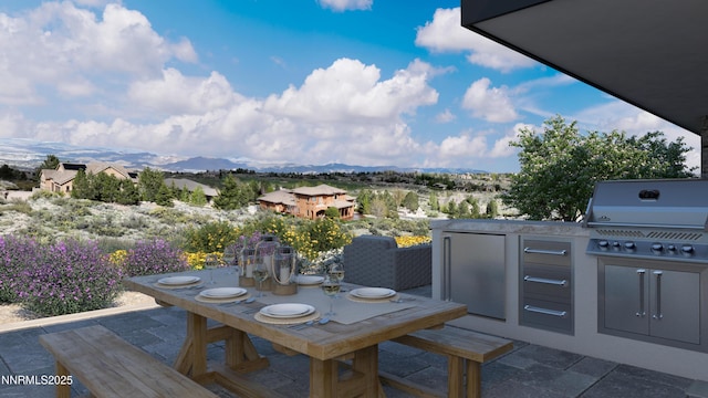 6832 Rabbit Brush Ct, Reno, NV 89511 - view of patio with a mountain view, an outdoor kitchen, and outdoor dining space