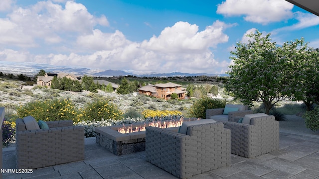 6832 Rabbit Brush Ct, Reno, NV 89511 - view of patio / terrace with a fire pit and a mountain view